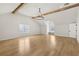 Versatile bonus room with vaulted ceilings, exposed beams, and natural light, ideal for relaxing at 3735 Hamilton Mill Rd, Buford, GA 30519