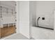 Mudroom featuring a tiled dog wash station, and storage shelves at 3735 Hamilton Mill Rd, Buford, GA 30519