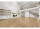 Bright and airy living room features soaring ceilings, fireplace, and ample natural light at 3735 Hamilton Mill Rd, Buford, GA 30519