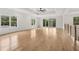 Spacious living room features hardwood floors, tray ceilings, and natural light at 3735 Hamilton Mill Rd, Buford, GA 30519