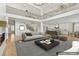 Bright, open-concept living room featuring high ceilings and views to the kitchen at 3735 Hamilton Mill Rd, Buford, GA 30519