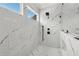 Beautiful marble shower with dual showerheads and window at 3735 Hamilton Mill Rd, Buford, GA 30519