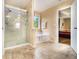 Beautiful bathroom featuring a glass shower and tub combination, perfect for relaxation at 5925 Crescent Landing Dr, Cumming, GA 30028