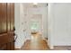 Inviting foyer with hardwood floors, neutral walls, and an open view to the living spaces beyond at 968 Dean Nw Dr, Atlanta, GA 30318