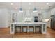 Bright kitchen with a large island, stainless steel appliances, and white cabinets at 968 Dean Nw Dr, Atlanta, GA 30318