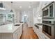 Spacious kitchen with stainless steel appliances and a large center island at 968 Dean Nw Dr, Atlanta, GA 30318