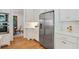 A modern kitchen featuring stainless steel appliances, white countertops and cabinets at 968 Dean Nw Dr, Atlanta, GA 30318