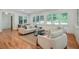 Inviting living room with hardwood floors and many windows at 968 Dean Nw Dr, Atlanta, GA 30318