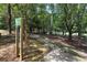 Scenic view of a tree-lined community walking trail, promoting an active and healthy lifestyle at 968 Dean Nw Dr, Atlanta, GA 30318