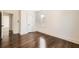 This bedroom has hardwood floors, a ceiling fan and a large window at 1337 M L King Jr Nw Dr, Atlanta, GA 30314