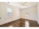 This bedroom is filled with natural light, hardwood floors and a ceiling fan at 1337 M L King Jr Nw Dr, Atlanta, GA 30314
