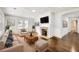 Bright living room features hardwood floors, fireplace, and ample natural light at 1337 M L King Jr Nw Dr, Atlanta, GA 30314