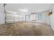 Spacious garage with windows and white cabinets, providing ample storage space at 3235 Harms Way, Snellville, GA 30039