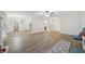 Open floor plan shows durable floors, leading from a cozy living space to other areas at 3235 Harms Way, Snellville, GA 30039