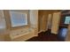 Bright bathroom with a soaking tub, walk-in shower, and dark wood-look flooring at 571 Cold Water Ln, Mcdonough, GA 30252