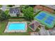 Aerial view of neighborhood amenities including a pool, tennis courts, and common areas at 1640 Mount Mckinley Dr, Grayson, GA 30017