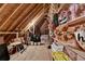 Large attic with exposed rafters provides plenty of storage space at 1640 Mount Mckinley Dr, Grayson, GA 30017