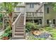Relaxing backyard featuring a rock garden with water feature and a deck, perfect for outdoor enjoyment at 1640 Mount Mckinley Dr, Grayson, GA 30017