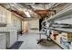 Unfinished basement with laundry, storage racks, and utility access at 1640 Mount Mckinley Dr, Grayson, GA 30017