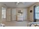 Bedroom featuring two beds, carpet and natural light from a window at 1640 Mount Mckinley Dr, Grayson, GA 30017