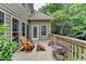 Enjoy the private outdoor deck with seating and lovely flower boxes at 1640 Mount Mckinley Dr, Grayson, GA 30017