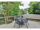 Inviting backyard deck with seating, perfect for enjoying nature views at 1640 Mount Mckinley Dr, Grayson, GA 30017