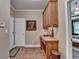 Hallway with desk, cabinet, and access to bedroom at 1640 Mount Mckinley Dr, Grayson, GA 30017