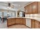 Updated kitchen featuring wood cabinets, tile floors and modern appliances at 1640 Mount Mckinley Dr, Grayson, GA 30017