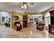 Expansive living room with hardwood floors, open layout, and easy access to kitchen and stairs at 1640 Mount Mckinley Dr, Grayson, GA 30017