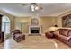 Bright living room boasting hardwood floors, fireplace, and ample natural light at 1640 Mount Mckinley Dr, Grayson, GA 30017