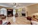 Spacious living room boasts a brick fireplace, hardwood floors, and large windows at 1640 Mount Mckinley Dr, Grayson, GA 30017