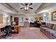 Large office space with multiple work stations and a comfortable sitting area at 1640 Mount Mckinley Dr, Grayson, GA 30017