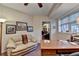 Home office with a desk, sofa, and carpeted floors at 1640 Mount Mckinley Dr, Grayson, GA 30017