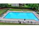 Community pool with plenty of seating, perfect for relaxing and socializing at 1640 Mount Mckinley Dr, Grayson, GA 30017