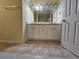 Bathroom featuring double sinks, modern vanity, tile floors, and tub shower combo at 2131 Meadow Peak Rd, Duluth, GA 30097