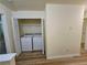 Conveniently placed laundry closet with new washer and dryer, offering ease and efficiency for household chores at 2131 Meadow Peak Rd, Duluth, GA 30097