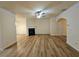 Bright and airy living room with wood floors and a cozy fireplace at 2131 Meadow Peak Rd, Duluth, GA 30097