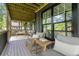 Inviting back deck featuring comfortable outdoor seating, a wood ceiling, and backyard views at 2608 Argo Drive Southeast Se Dr, Smyrna, GA 30080
