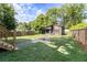Expansive backyard with new building, gravel pathway, fire pit and privacy fence at 2608 Argo Drive Southeast Se Dr, Smyrna, GA 30080