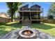 A well maintained backyard with fire pit and a two-story home with double decks at 2608 Argo Drive Southeast Se Dr, Smyrna, GA 30080