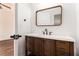Bathroom featuring a wood vanity, a neutral countertop, and modern fixtures at 2608 Argo Drive Southeast Se Dr, Smyrna, GA 30080