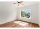 Bright bedroom with large window offering natural light and hardwood floors at 2608 Argo Drive Southeast Se Dr, Smyrna, GA 30080