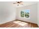 Cozy room featuring natural light, hardwood floors, and a ceiling fan at 2608 Argo Drive Southeast Se Dr, Smyrna, GA 30080