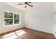Bright bedroom with a large window and new flooring at 2608 Argo Drive Southeast Se Dr, Smyrna, GA 30080