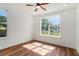 Bright bedroom with natural light, hardwood floors and ceiling fan at 2608 Argo Drive Southeast Se Dr, Smyrna, GA 30080