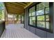 Spacious outdoor deck featuring modern railings, gray deck boards, and a view of the backyard at 2608 Argo Drive Southeast Se Dr, Smyrna, GA 30080