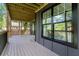 Spacious wooden deck features black railings and provides a great outdoor living space at 2608 Argo Drive Southeast Se Dr, Smyrna, GA 30080