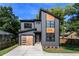 Charming two-story home with modern architectural details, clean lines, and well-manicured landscaping at 2608 Argo Drive Southeast Se Dr, Smyrna, GA 30080