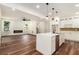 Bright, open-concept kitchen with a large center island and hardwood flooring at 2608 Argo Drive Southeast Se Dr, Smyrna, GA 30080