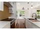 Modern kitchen featuring stainless steel appliances, countertops, and a decorative backsplash at 2608 Argo Drive Southeast Se Dr, Smyrna, GA 30080